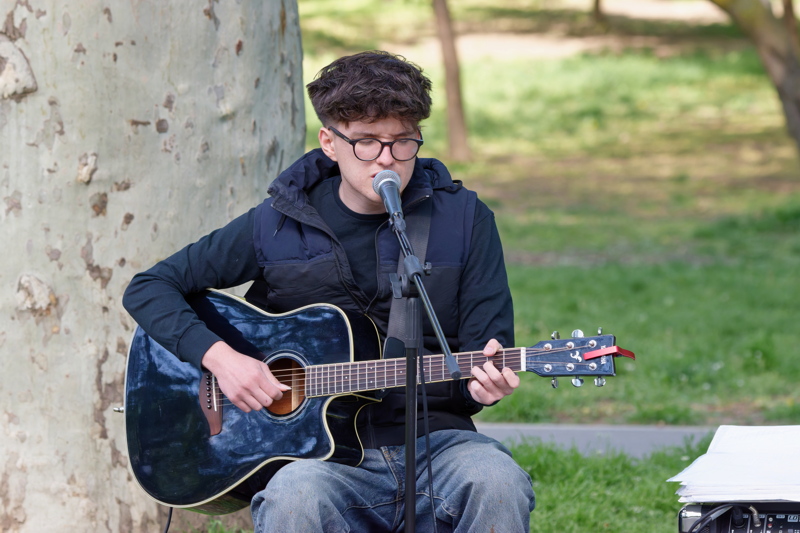 Boy playing a guitar